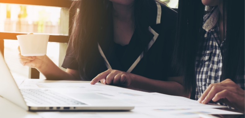 Women working together on their startup